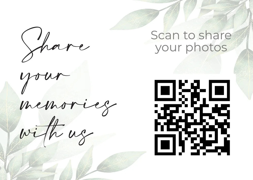 Wedding table card with soft green leaves, handwritten style wording and a QR code to share photos