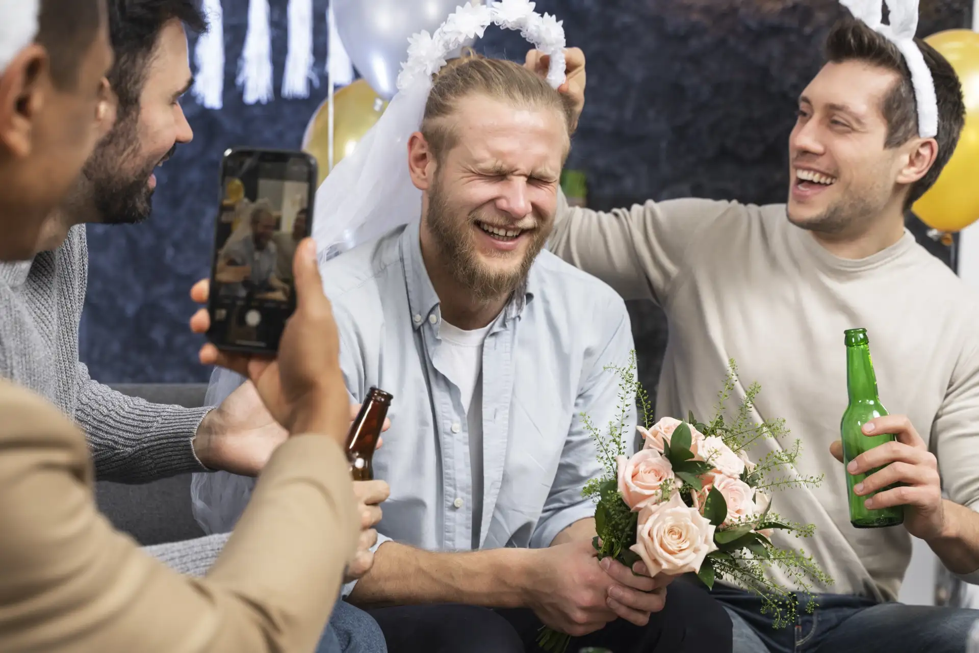 Group of friends celebrating together on a stag do